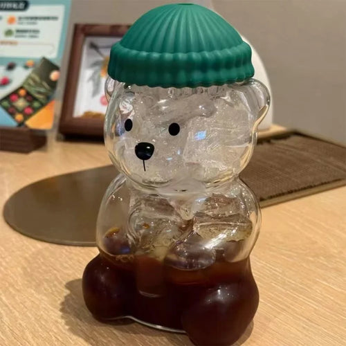 20oz Teddy Mug Bear Glass Tumbler with clear design and sturdy handle, ideal for hot or cold beverages.